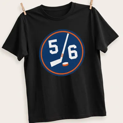 Hockey-themed shirt with a 5/6 emblem featuring a stick and puck in navy, white, and orange