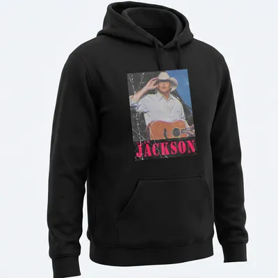 Vintage distressed t-shirt featuring Alan Jackson with guitar graphic — printed on a unisex hoodie