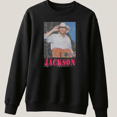 Vintage distressed t-shirt featuring Alan Jackson with guitar graphic — printed on a unisex sweatshirt