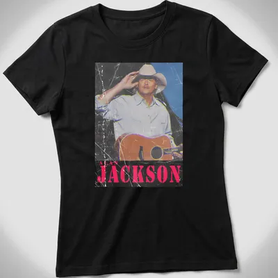 Vintage distressed t-shirt featuring Alan Jackson with guitar graphic — printed on a women's shirt