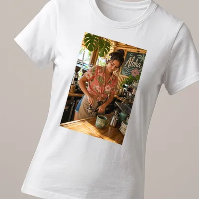 Photographic Aloha Barista t-shirt with a cheerful coffee maker in aloha — printed on a women's shirt
