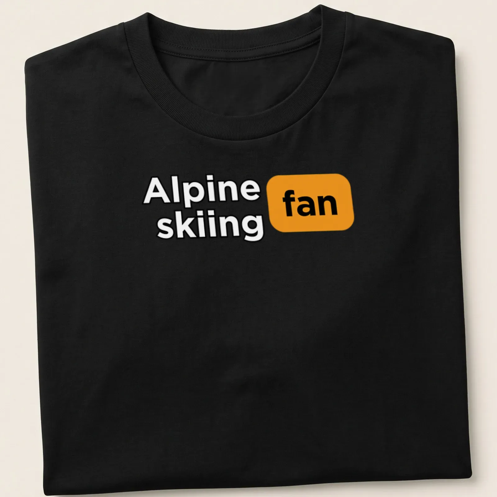 Bold graphic Alpine skiing fan t-shirt with dynamic skiing illustration in black, orange, and white — printed on a unisex t-shirt