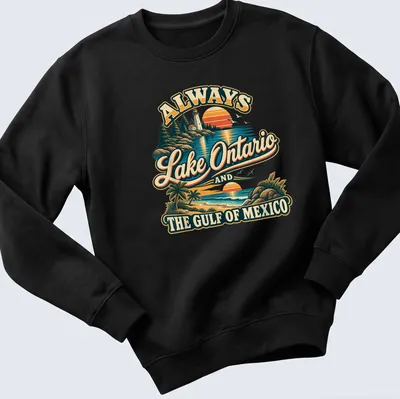 Vintage-style t-shirt featuring a lighthouse and coastal view with colorful retro design. — printed on a unisex sweatshirt