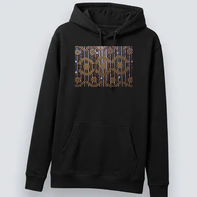 Ceremonial designs with text representing Anmatyerre culture in vibrant colors. — printed on a unisex hoodie