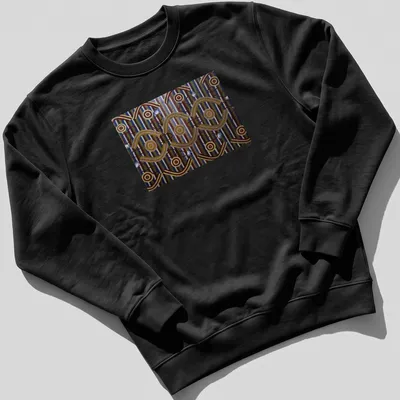Ceremonial designs with text representing Anmatyerre culture in vibrant colors. — printed on a unisex sweatshirt