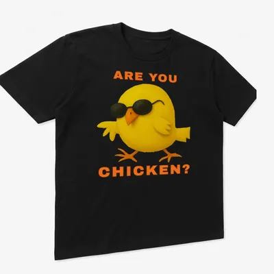 Playful illustration of a cool chick with sunglasses and text 'ARE YOU CHICKEN?' — printed on a unisex t-shirt (angled view)