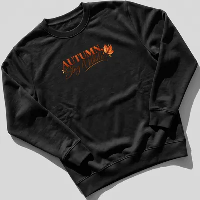 Script font autumn quote t-shirt featuring colorful leaves — printed on a unisex sweatshirt
