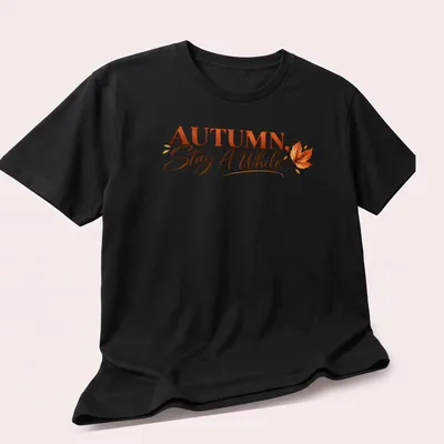 Script font autumn quote t-shirt featuring colorful leaves — printed on a unisex t-shirt (angled view)