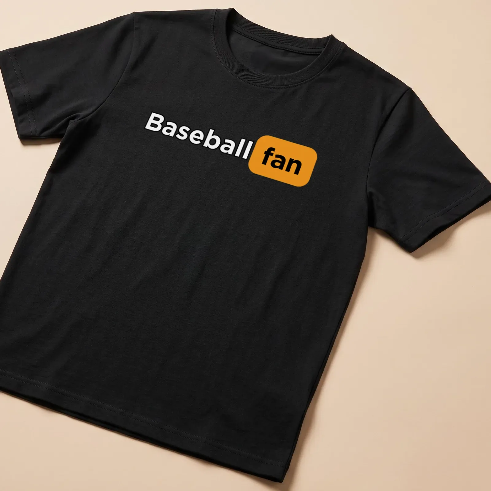 Bold typography shirt stating 'Baseball fan' in black and orange. — printed on a unisex t-shirt