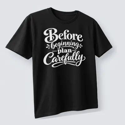 Hand-lettered script saying 'Before beginning plan Carefully' in black text — printed on a unisex t-shirt (angled view)