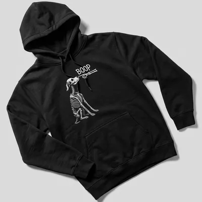 Playful Halloween design featuring a dog skeleton with the word Boop above — printed on a unisex hoodie