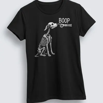 Playful Halloween design featuring a dog skeleton with the word Boop above — printed on a women's shirt