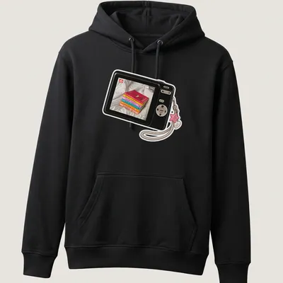 Realistic print of a camera surrounded by colorful books with the text Camera Picture Of Books — printed on a unisex hoodie