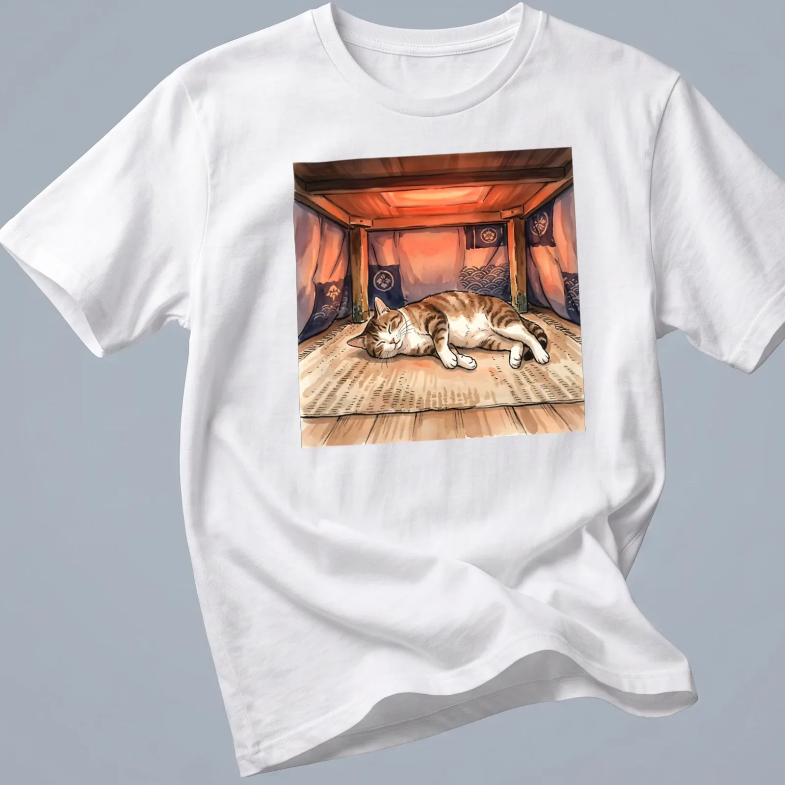 Watercolor print of a tabby cat napping under a kotatsu with the text above. — printed on a unisex t-shirt
