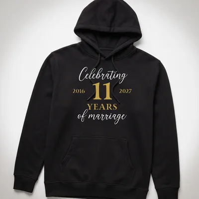 Elegant t-shirt celebrating 11 years of marriage with gold and white lettering. — printed on a unisex hoodie