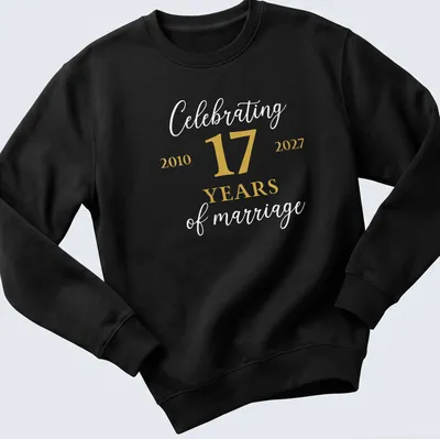 Elegant script t-shirt celebrating 17 years of marriage in gold and white. — printed on a unisex sweatshirt