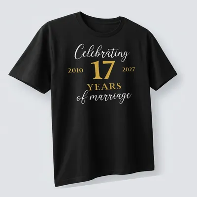 Elegant script t-shirt celebrating 17 years of marriage in gold and white. — printed on a unisex t-shirt (angled view)