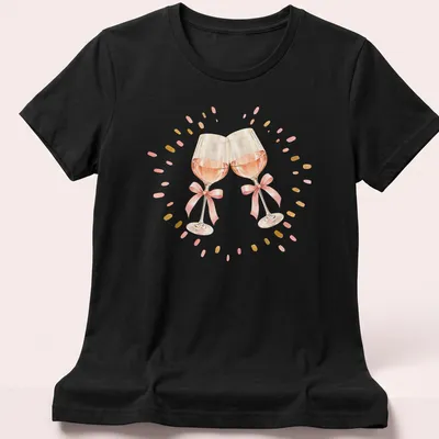 Watercolor design of two pink wine glasses clinking against a white background — printed on a women's shirt