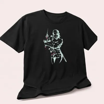 Ciri from The Witcher in a sword-fighting pose, illustrated in Sumi-e style — printed on a unisex t-shirt (angled view)