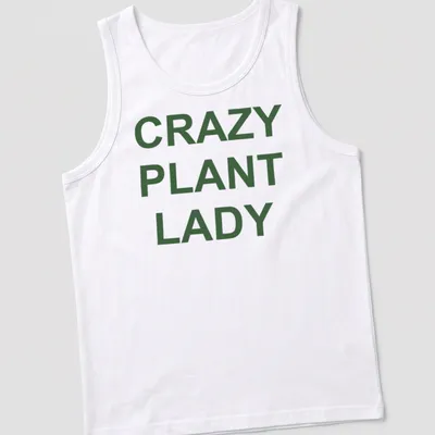 Bold typography CRAZY PLANT LADY shirt with green text on white background — printed on a tank top