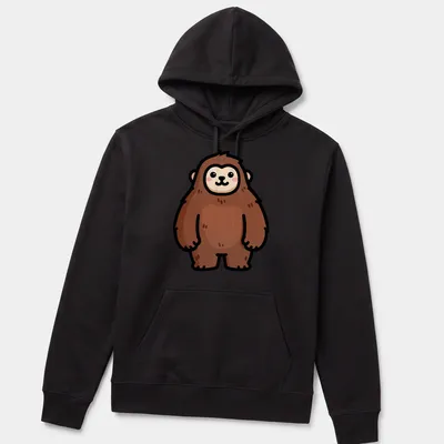 Kawaii style illustration of a cute brown yeti sasquatch monster with big eyes. — printed on a unisex hoodie