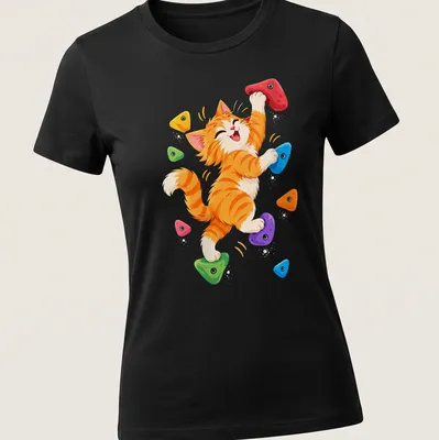 Kawaii illustration of an orange tabby kitten rock climbing in vibrant colors — printed on a women's shirt