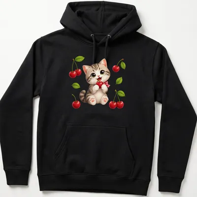 Kawaii kitten eating a red cherry, with playful text in a cute font. — printed on a unisex hoodie