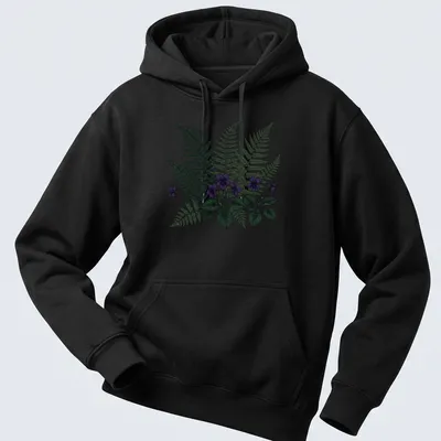Moody botanical print featuring purple violets and ferns with elegant text. — printed on a unisex hoodie