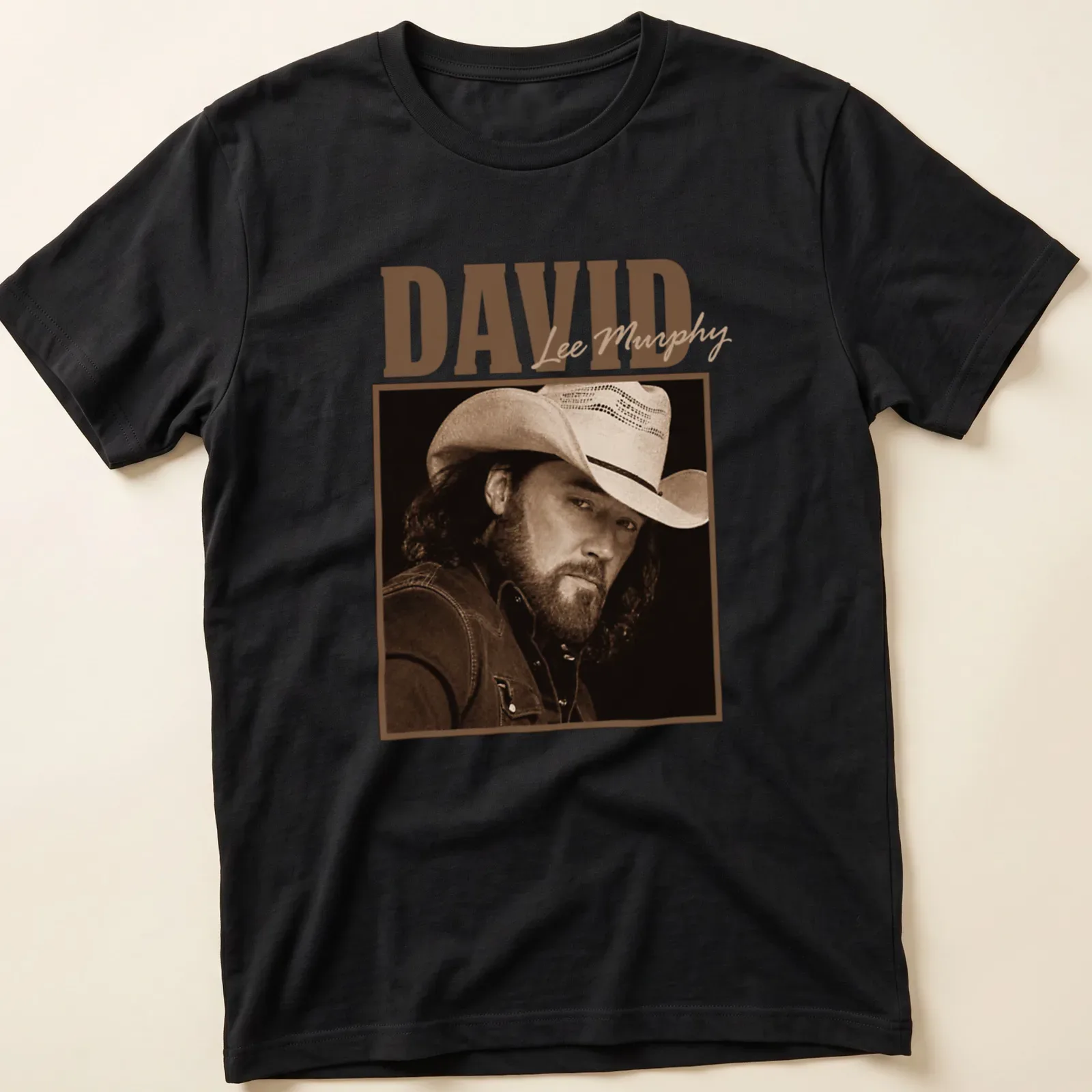 Vintage sepia portrait of David Lee Murphy in a cowboy hat — printed on a unisex t-shirt