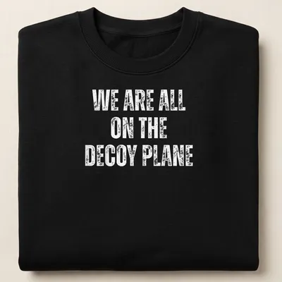 Bold typography t-shirt featuring a decoy plane and humorous text. — printed on a unisex sweatshirt