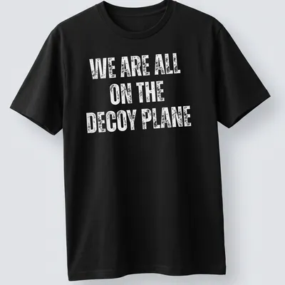 Bold typography t-shirt featuring a decoy plane and humorous text.