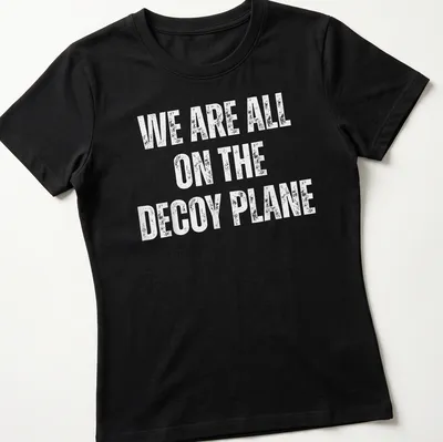 Bold typography t-shirt featuring a decoy plane and humorous text. — printed on a women's shirt
