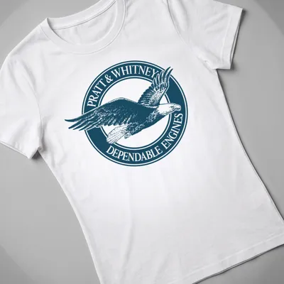 Vintage emblem t-shirt featuring an eagle and Pratt & Whitney text in navy and white. — printed on a women's shirt