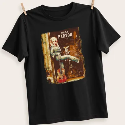 Vintage Dolly Parton T-shirt with retro design and bold text