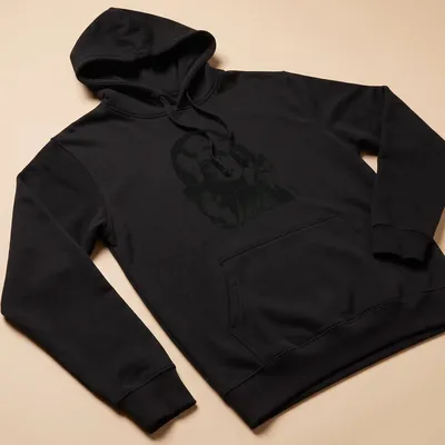 Vintage pencil drawing of Dolly Parton in black and white — printed on a unisex hoodie