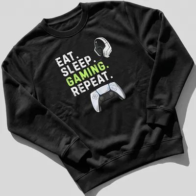 Bold gaming tee with graphic text 'Eat Sleep Gaming Repeat' and controller design — printed on a unisex sweatshirt