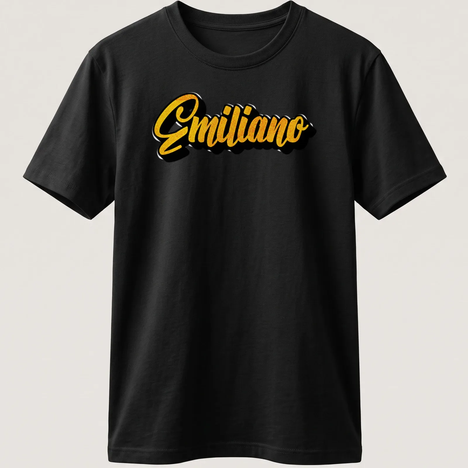Personalized t-shirt featuring the name Emiliano in bold yellow script — printed on a unisex t-shirt