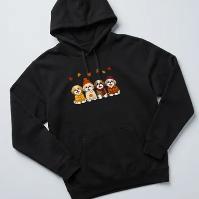 Kawaii line-art of Shih Tzu dogs with pumpkins in autumn colors — printed on a unisex hoodie