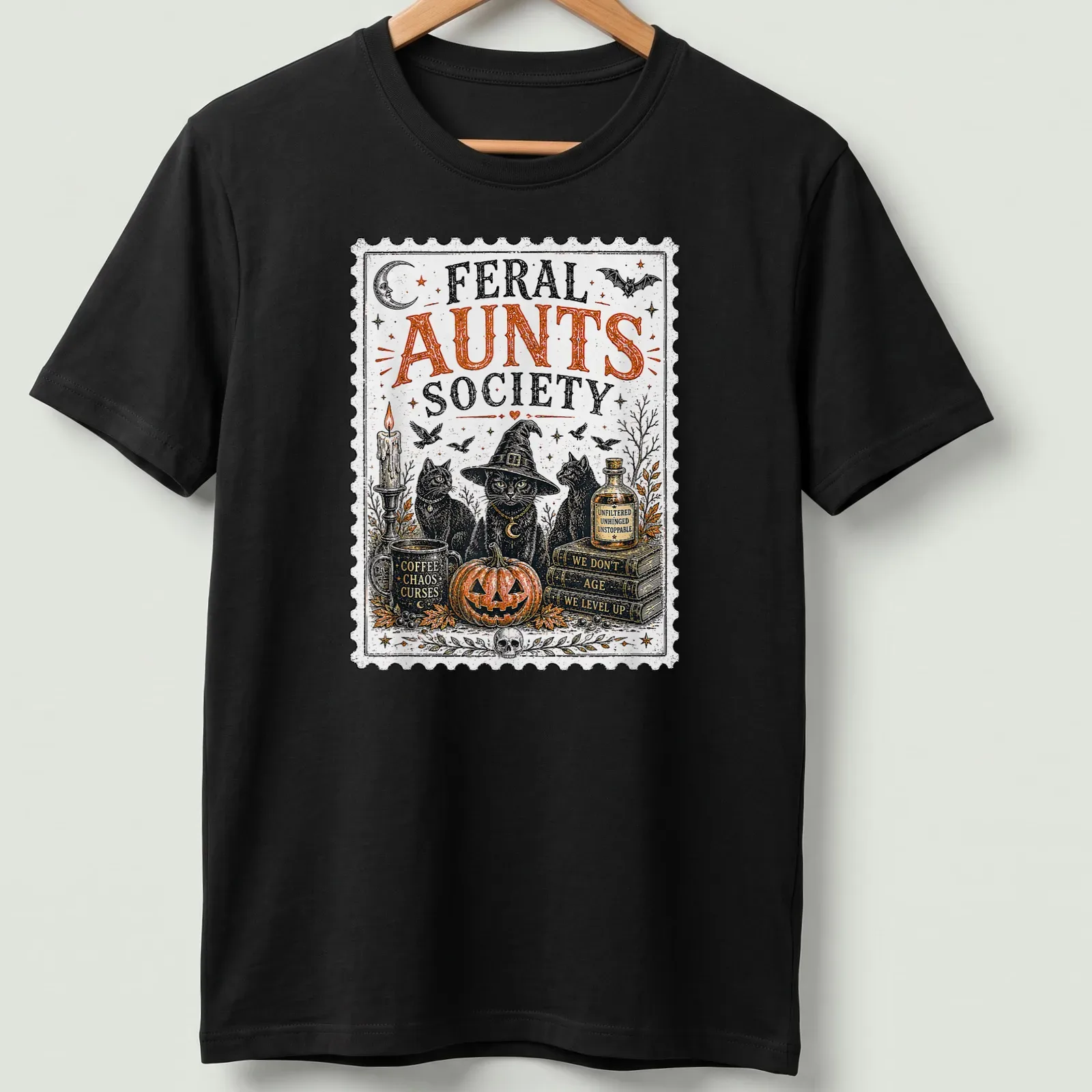 Vintage stamp print featuring three black cats in witch hats. — printed on a unisex t-shirt