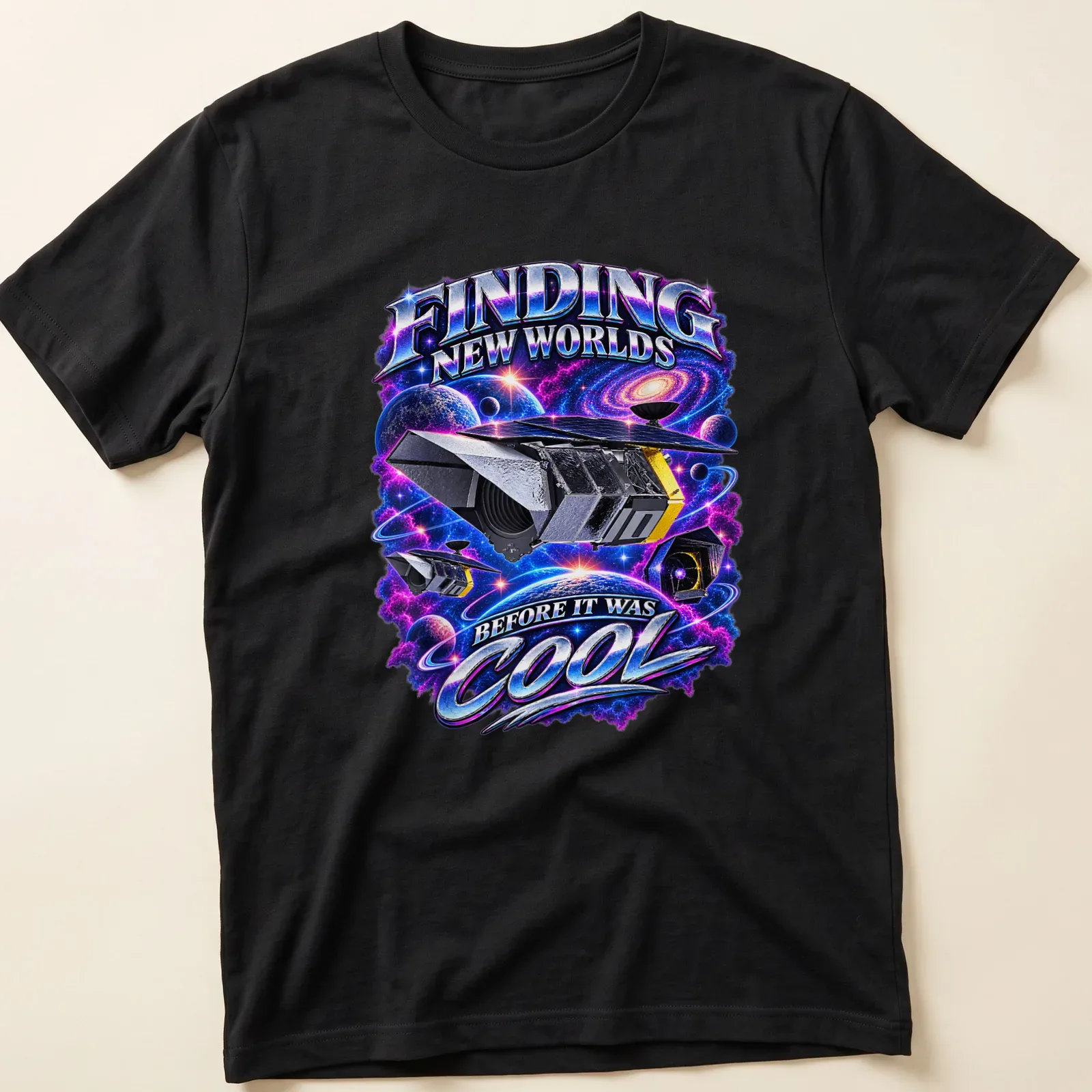 Cosmic design of a space telescope with the text about finding worlds. — printed on a unisex t-shirt