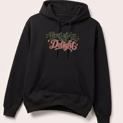 Playful retro shirt with decorative text and stars in black, pink, gold, and white — printed on a unisex hoodie