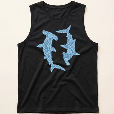 Illustration of floral hammerhead sharks in light and dark blue with white accents — printed on a tank top