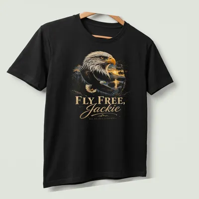 Detailed illustration of a bald eagle with golden feathers and blue sky backdrop. — printed on a unisex t-shirt (angled view)