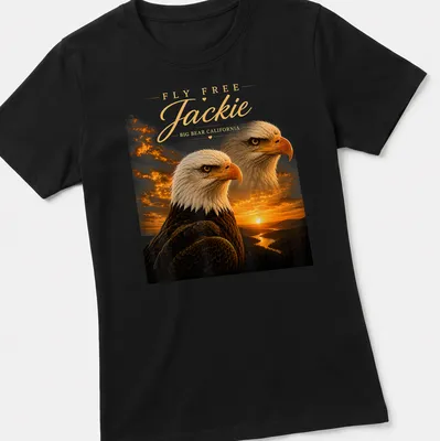 Realistic print of a Bald Eagle in flight with text FLY FREE Jackie BIG BEAR CALIFORNIA — printed on a women's shirt