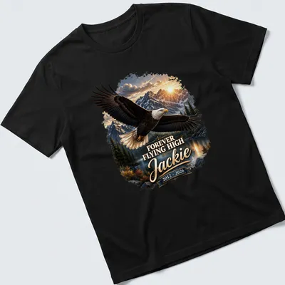 Realistic Bald Eagle soaring against a sunset with text Forever Flying High Jackie 2012 - 2026