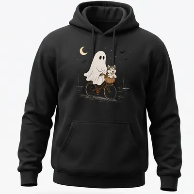 Cartoon of an Alaskan Malamute riding a bicycle, with Halloween themes — printed on a unisex hoodie