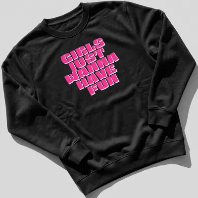 Bold pink typography shirt with the phrase 'Girls Just Wanna Have Fun' — printed on a unisex sweatshirt