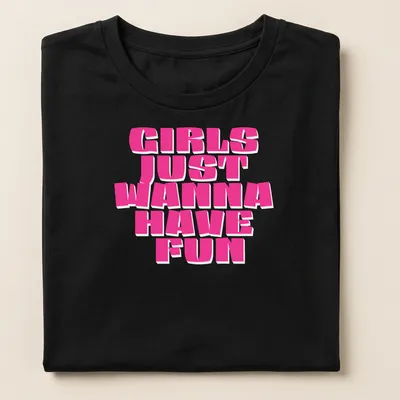 Bold pink typography shirt with the phrase 'Girls Just Wanna Have Fun' — printed on a women's shirt