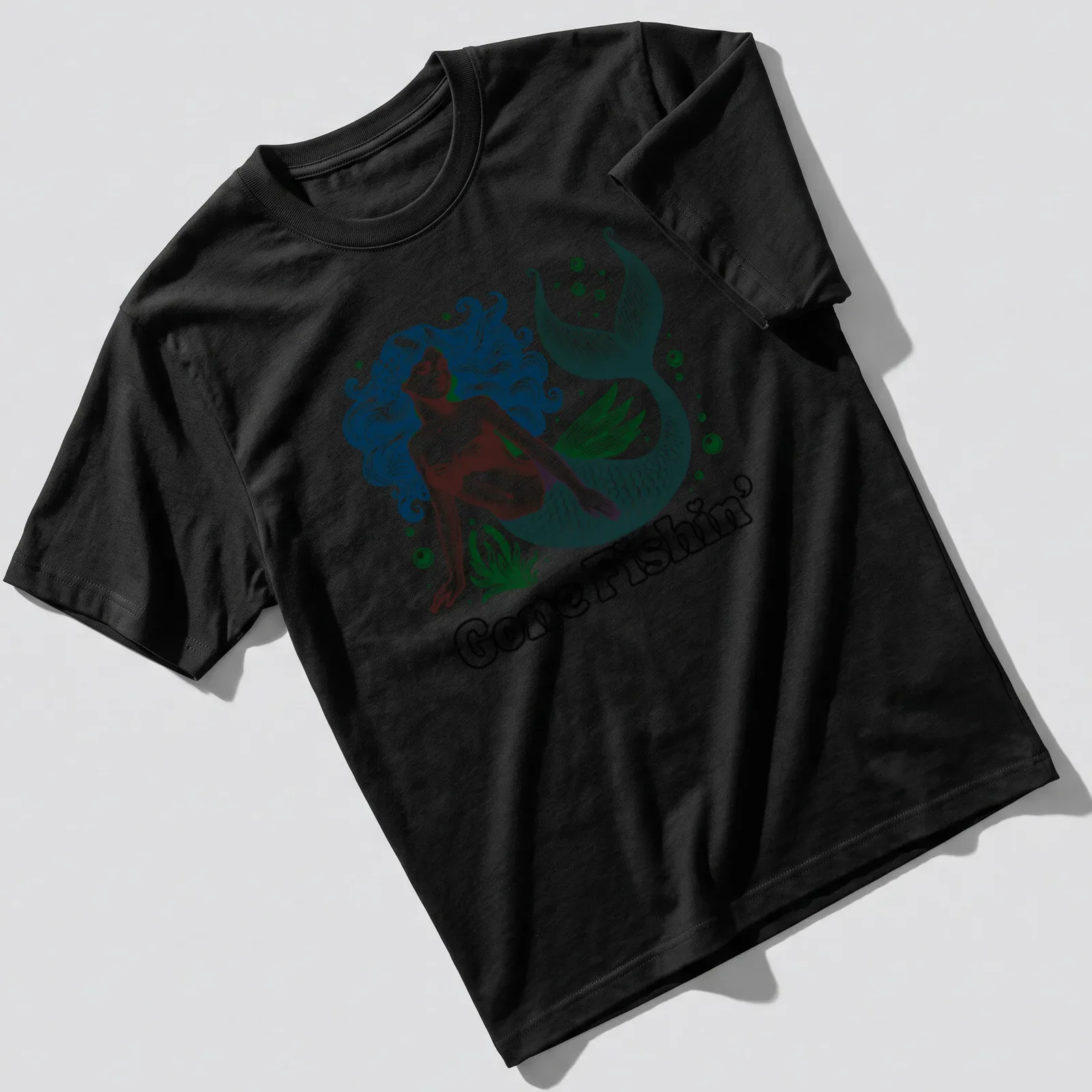 Vintage woodcut print of a mermaid and 'Gone Fishin' text in teal and blue — printed on a unisex t-shirt