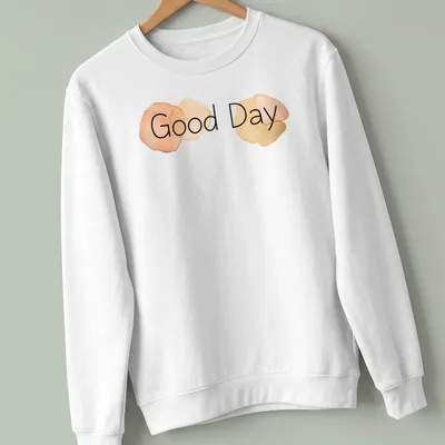 Minimalist t-shirt featuring watercolor circles and the words Good Day in soft colors — printed on a unisex sweatshirt